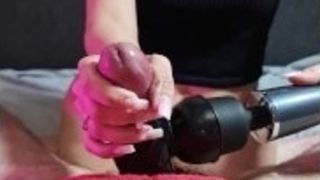 Super-hot mommy stroking him with massager Attachment