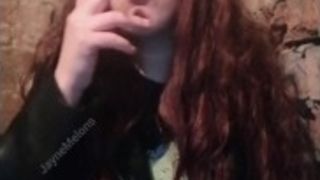 Smoking red-haired emo. Smokey tongue