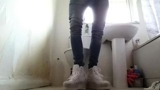 Crossdresser in tight jeans and Sneakers