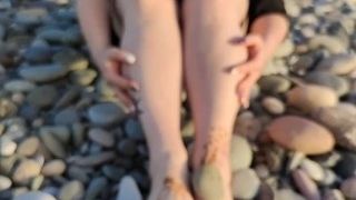 Podophilia. Domina Lara demonstrates her magnificent soles on the beach