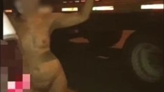 Bubbles gets naked in a truck stop parking lot.