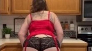 Plumper stepmother cougar striptease in the kitchen your point of view