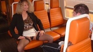 Milf and youthfull man in train