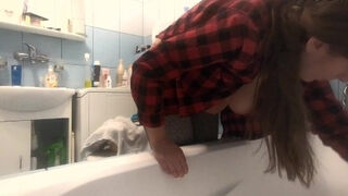'Big cupcakes Lena downblouse while cleaning bathtube'
